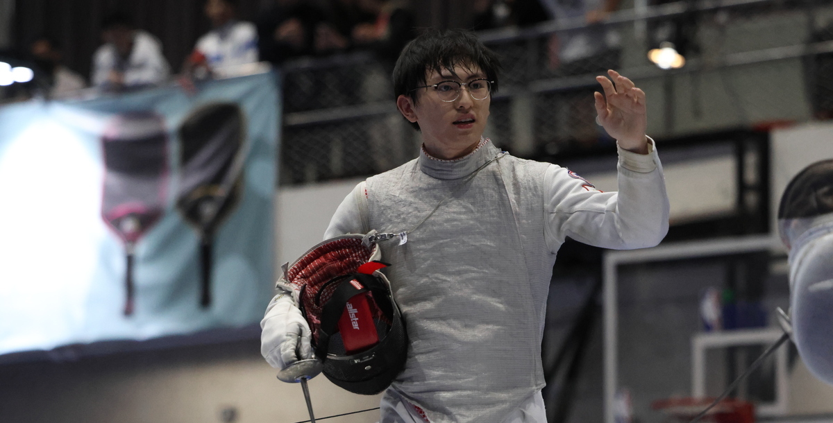 輔大許勝閎擔任今日公開男生組鈍劍團體賽最後一棒。攝/SSU特派員